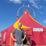 High resolution photo of man in front of circus tent